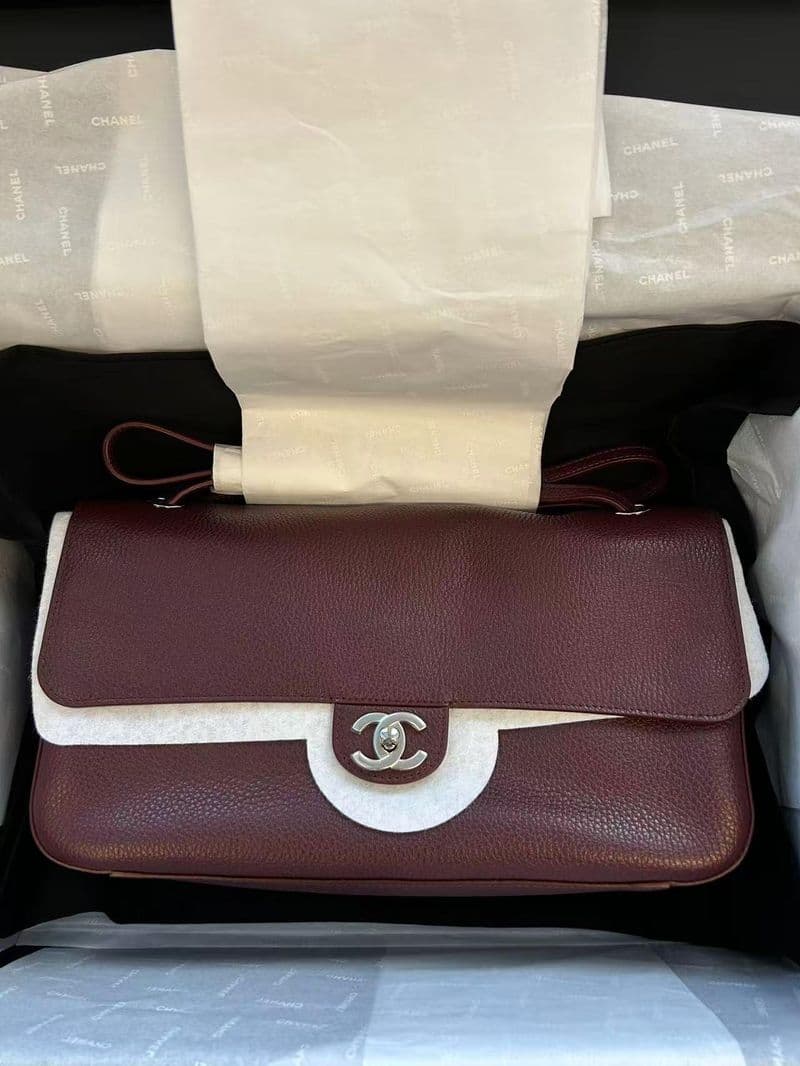 Hermès Classic Flap in Black Lamb GHW hardware — front view