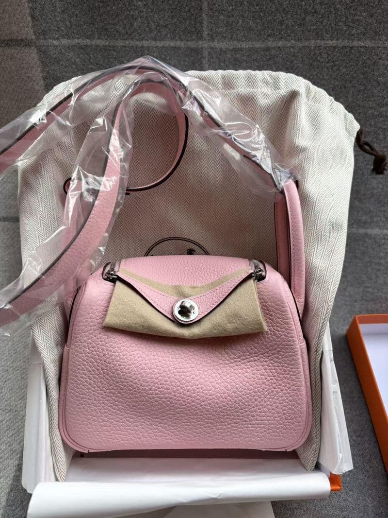 Hermès Mini Lindy in Rose sakura TC PHW hardware — front view