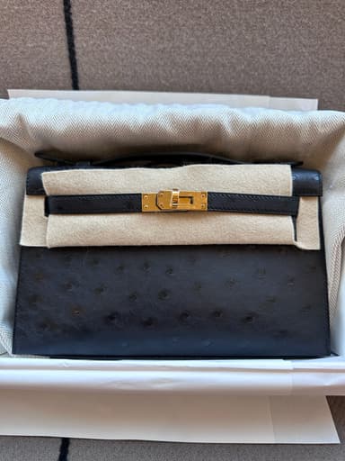 Hermès Kelly Pochette Black Ostrich GHW