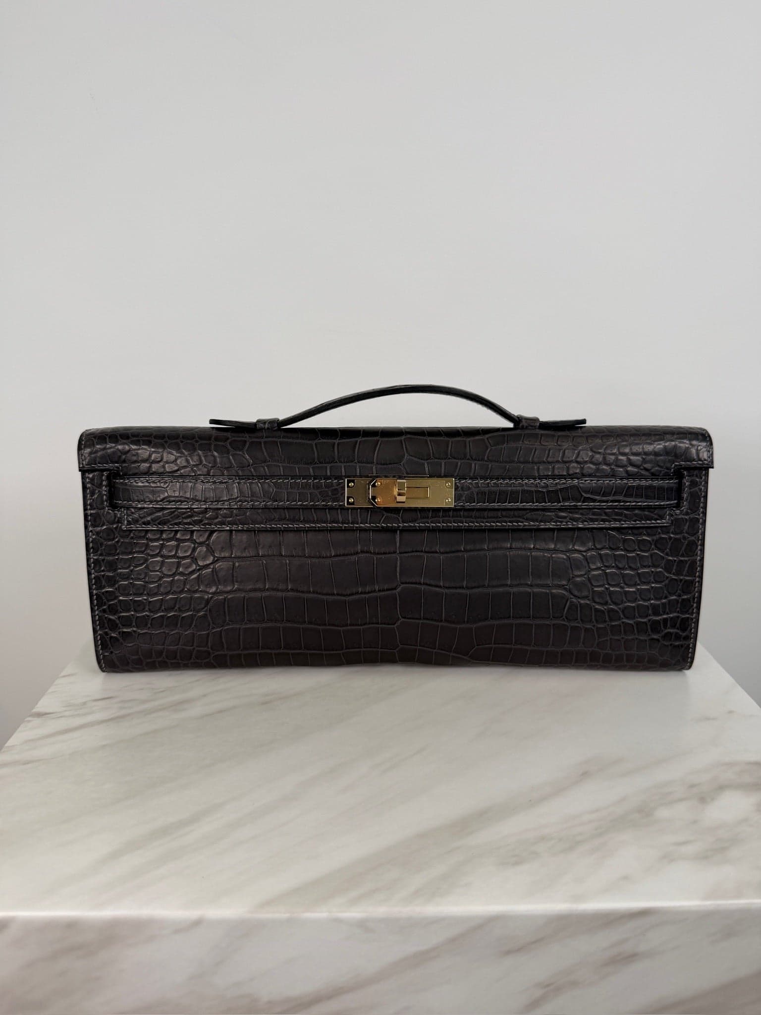 Hermès Kelly Cut Cut in Graphite Matt Porosus Permabrass Hardware hardware — front view
