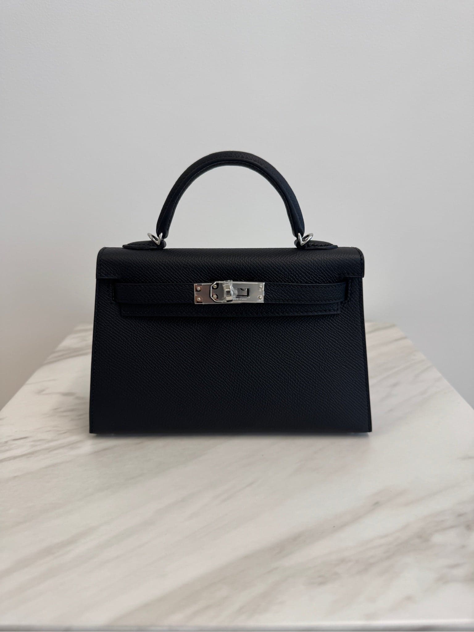 Hermès Kelly 20 20 in Black/ Gold Epsom Palladium Hardware hardware — front view