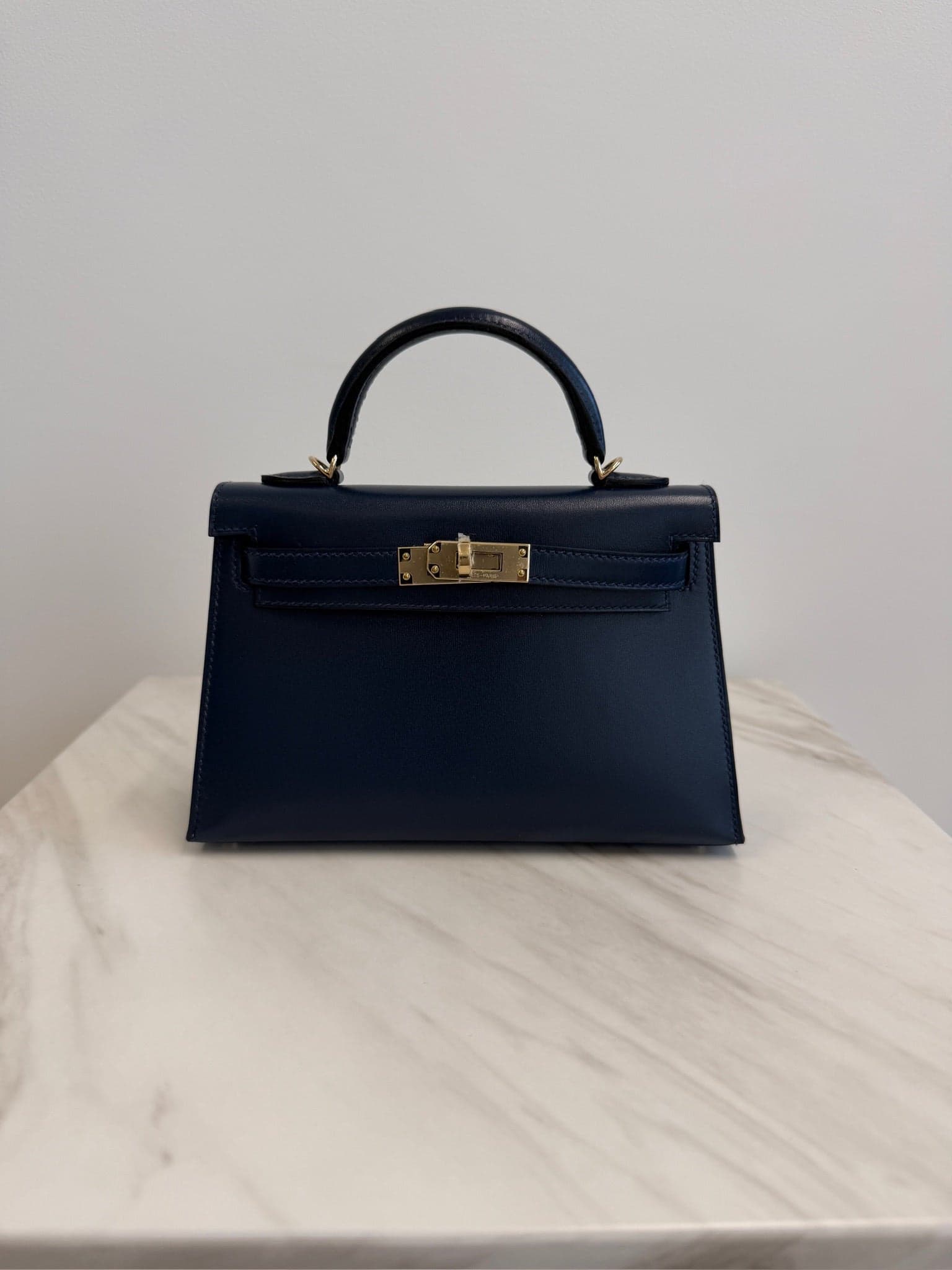 Hermès Kelly 20 20 in Bleu Abysse Box Permabrass Hardware hardware — front view