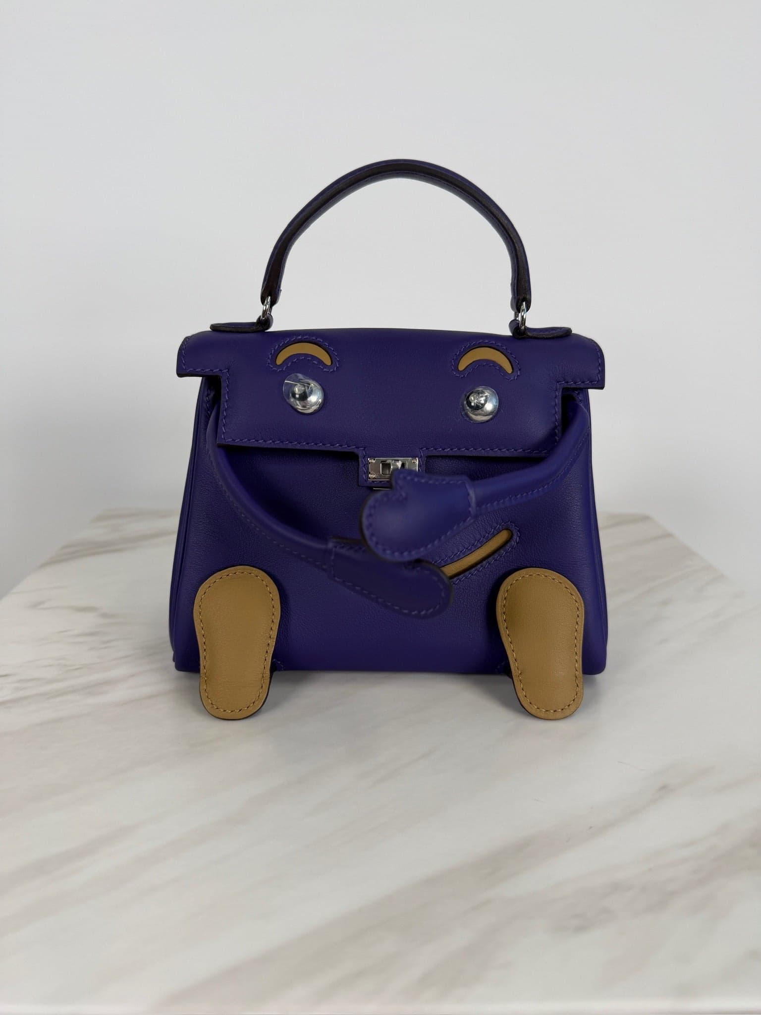 Hermès Kelly Doll NA in Purple/ Dune Swift Palladium Hardware hardware — front view