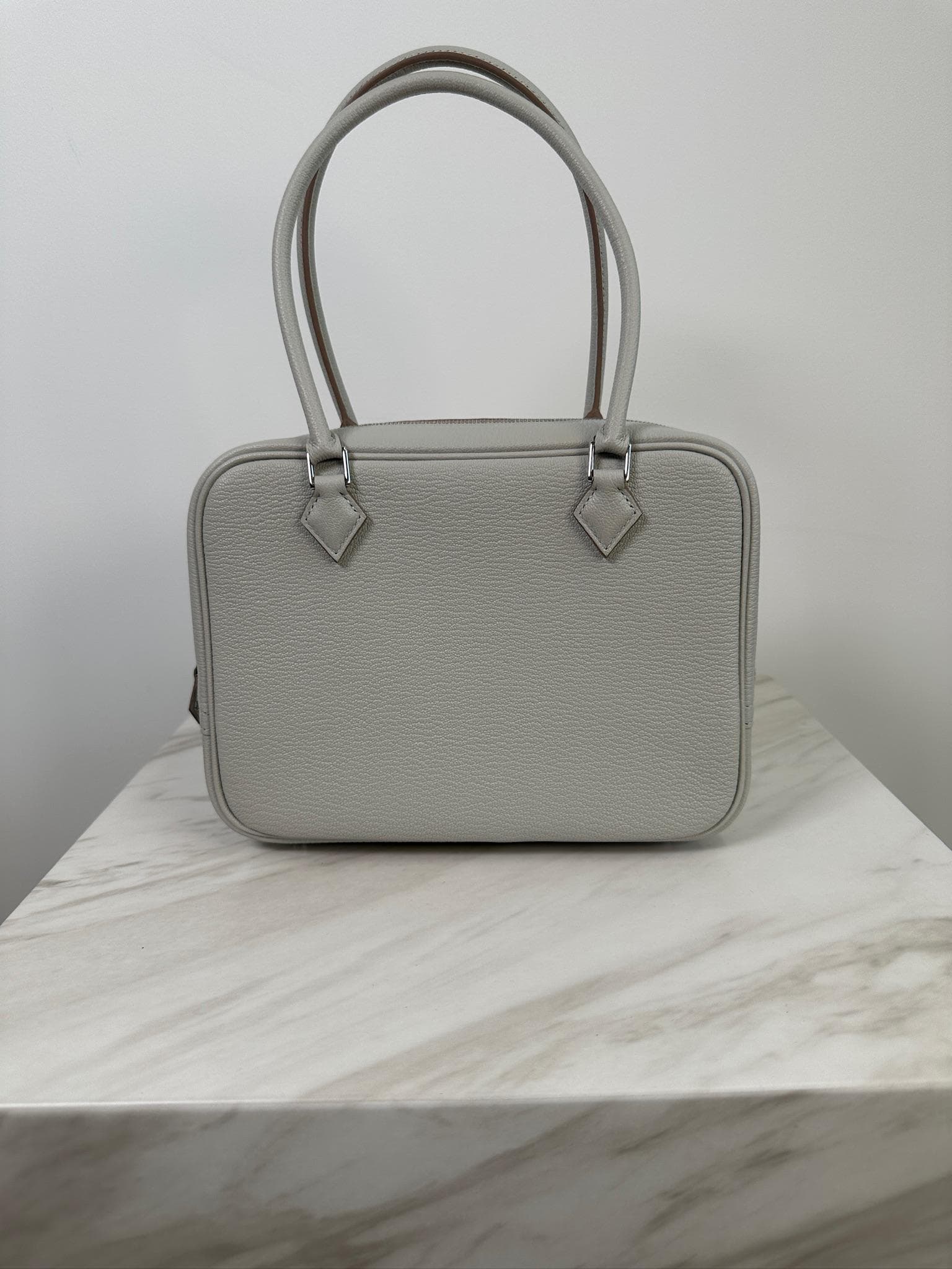 Hermès Mini Plume Mini in Gris Perle Chevre Palladium Hardware hardware — front view