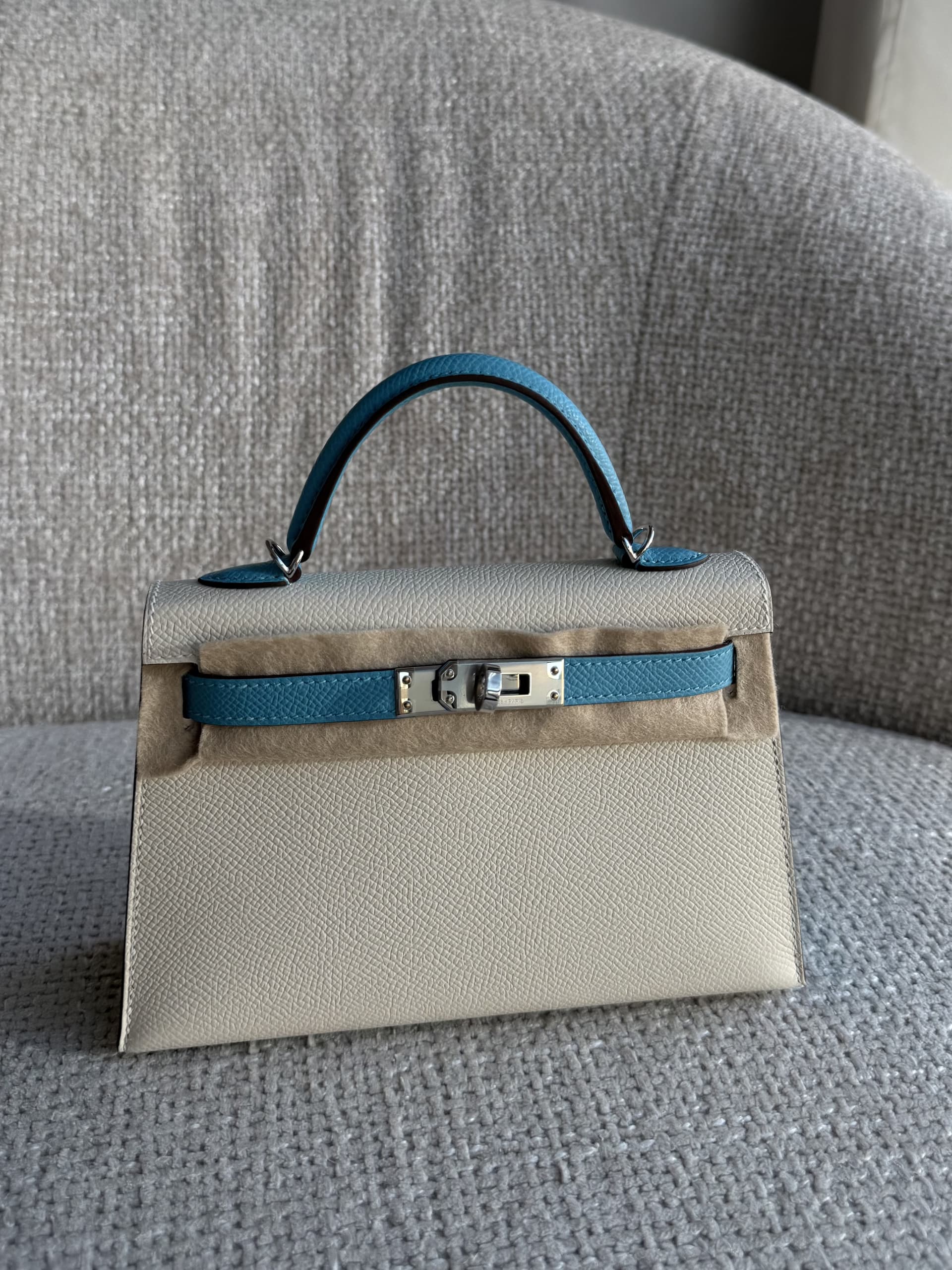 Hermès Mini Kelly 20 in Craie/blue du Nord Epsom Palladium (PHW) hardware — front view