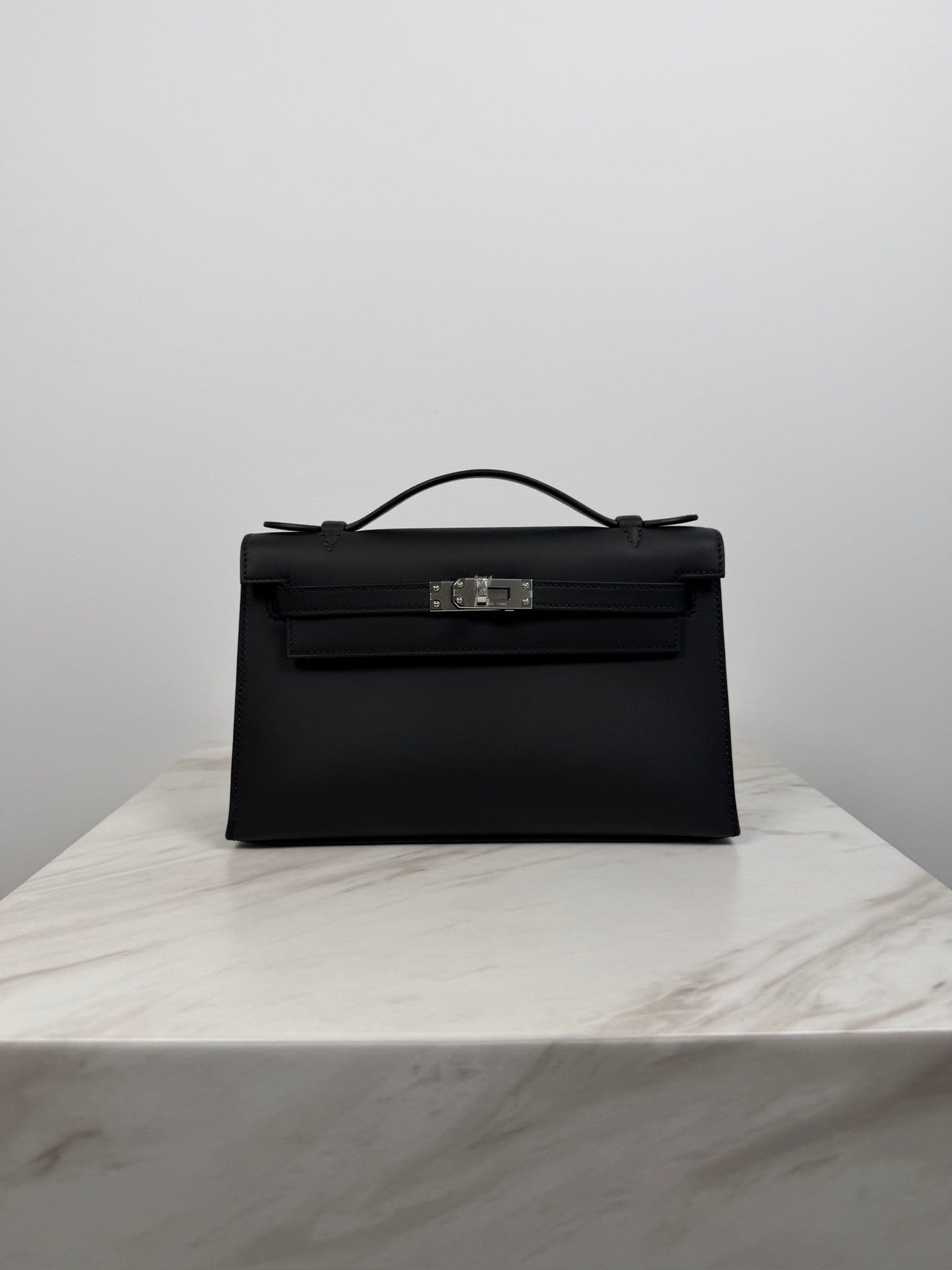 Hermès Kelly Pochette in Black Swift Palladium (PHW) hardware