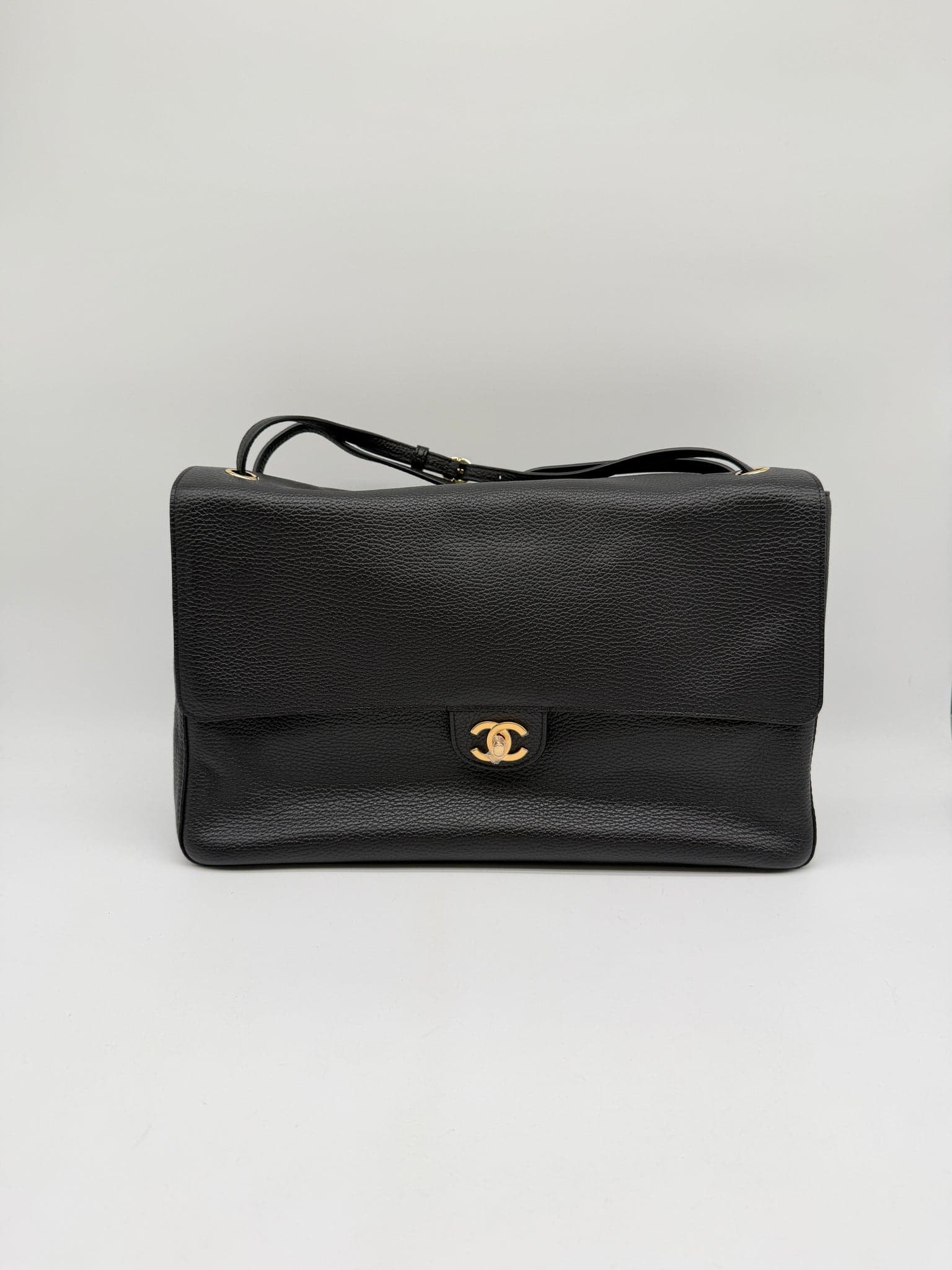 Chanel Maxi Flap Bag 38.5 in Black Grained Calfskin Gold (GHW) hardware — front view