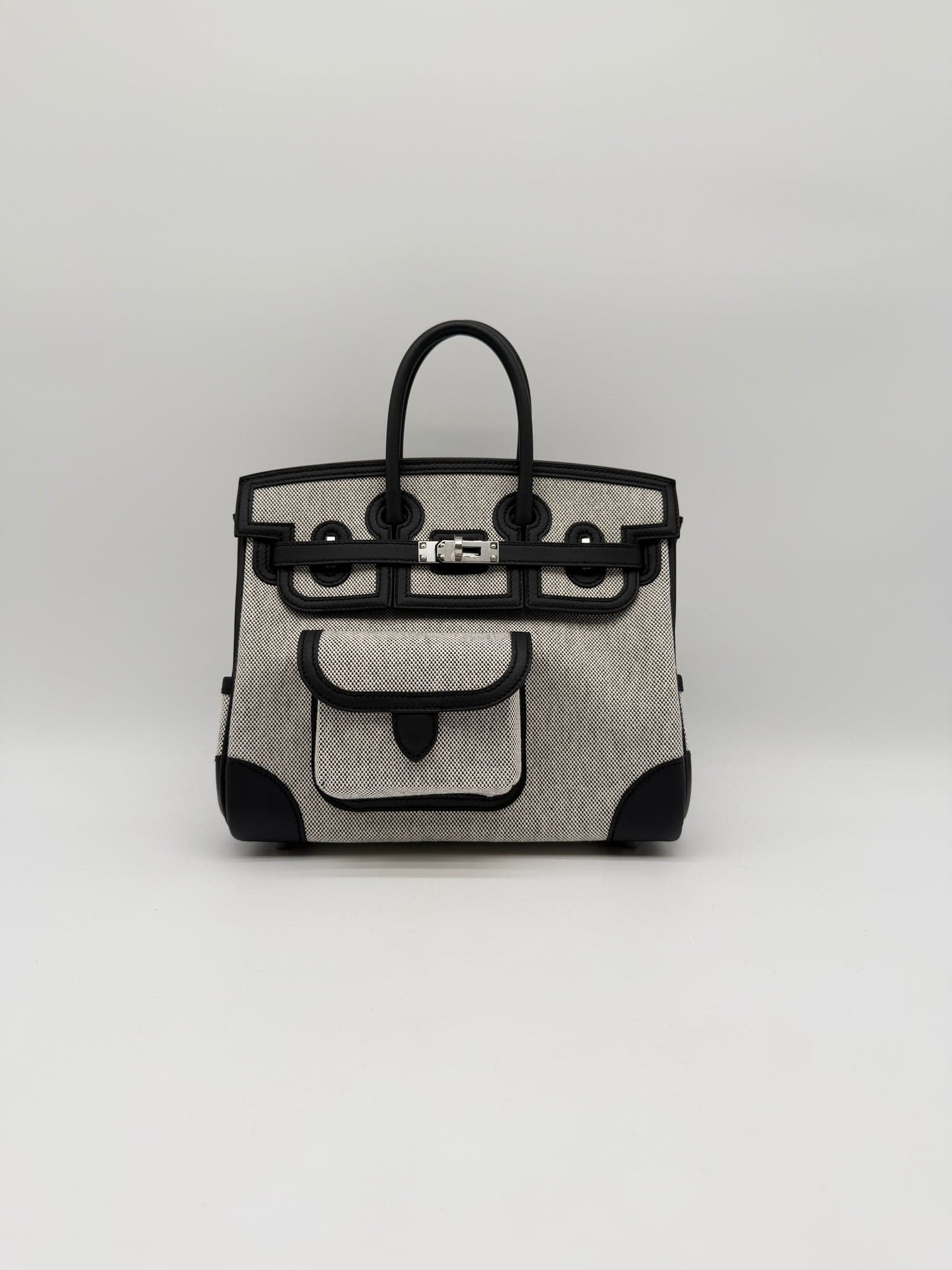 Hermès Birkin 25 Cargo in Noir/Ecru Toile/ Swift Palladium (PHW) hardware — front view
