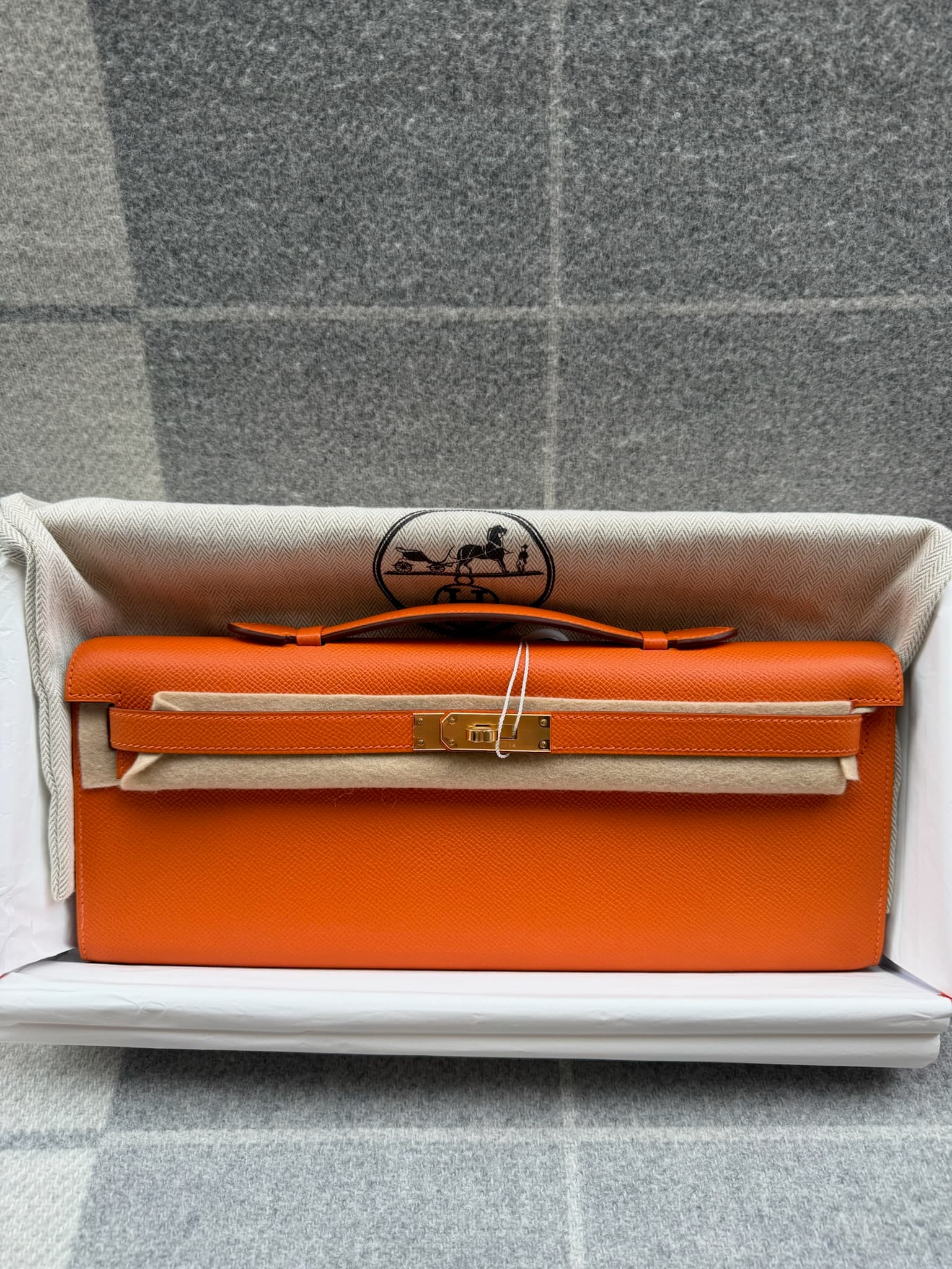 Hermès Kelly Cut in Orange H Epsom Gold (GHW) hardware — front view