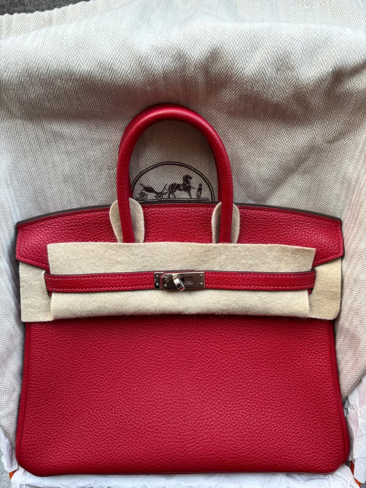 Hermès Birkin 25 in Rouge Vif Togo PHW hardware — front view