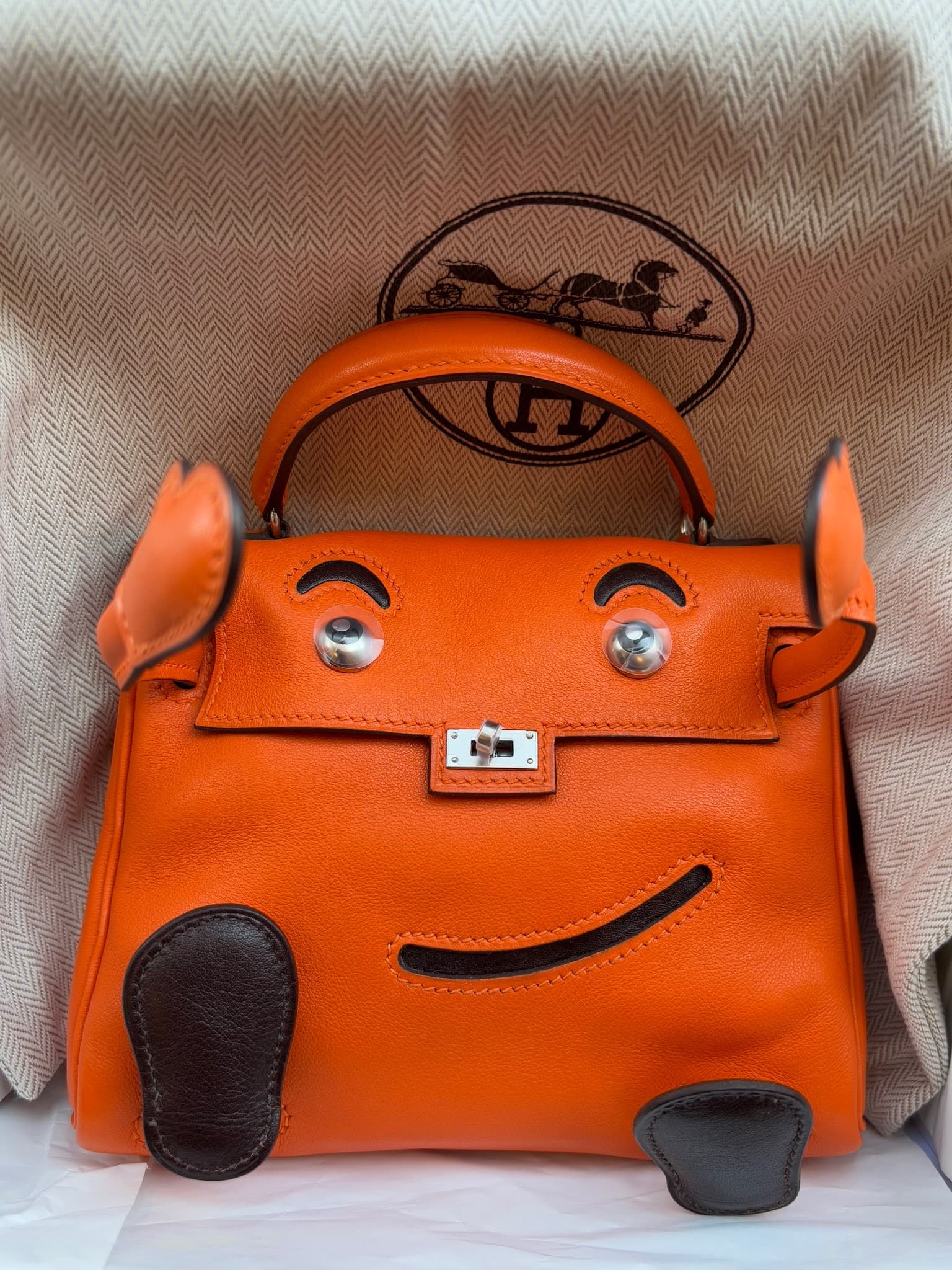 Hermès Kelly Doll in Orange/Ebene Gulliver GHW hardware — front view