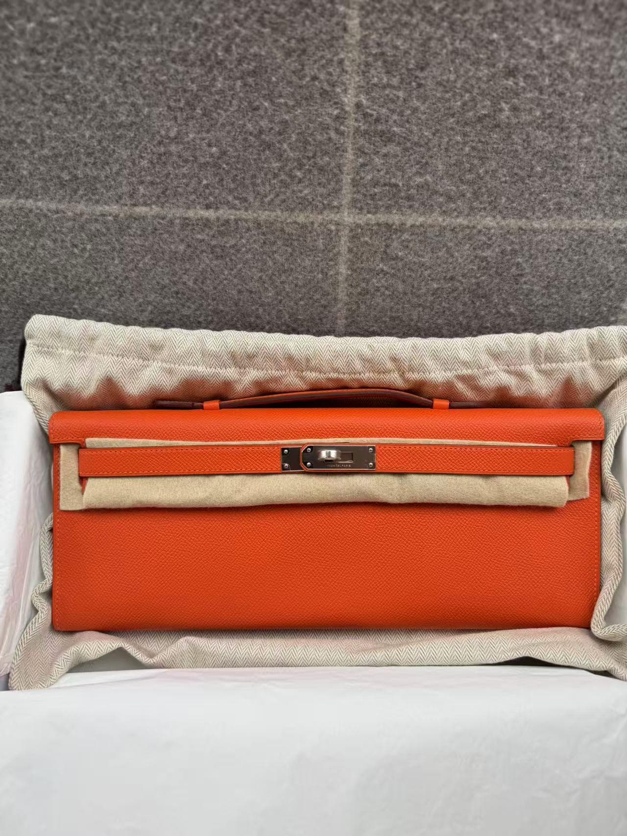 Hermès Kelly Cut in Orange Epsom PHW hardware — front view
